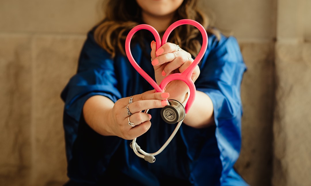 nurse with heart-shaped stethoscope